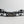 4.0mm black stainless steel Herm Sprenger prong collar with an Antique Brass Boss Buckle